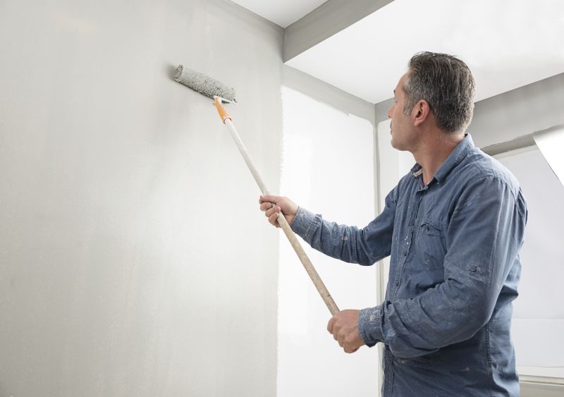 Handyman Painting a Room